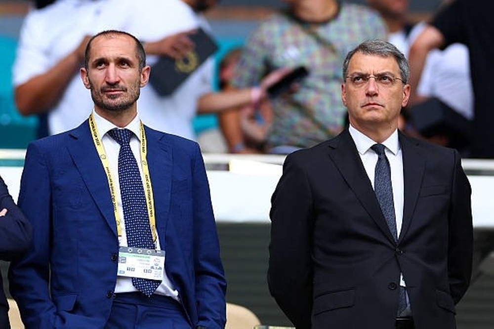 Juventus chief ⁠executive Damien Comolli  (R)