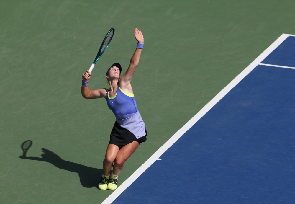 Russia's Mirra Andreeva in action  against Romania's Jaqueline Cristian 