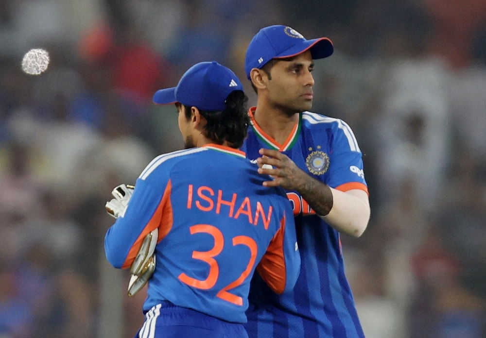  India's Suryakumar Yadav celebrates with Ishan Kishan 