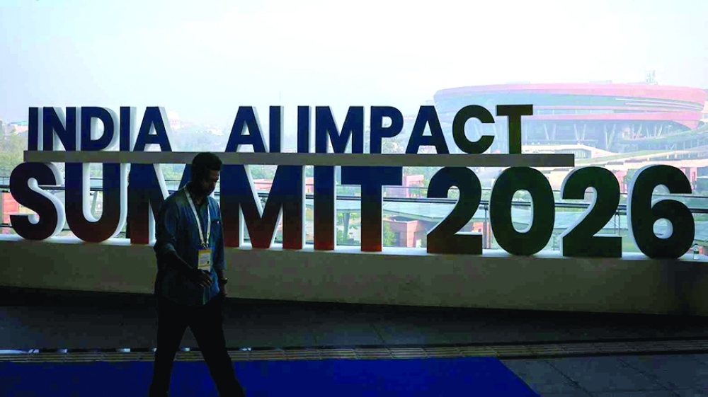 
A visitor walks inside an exhibition hall at a venue for the AI Impact Summit at Bharat Mandapam in New Delhi. — Reuters 