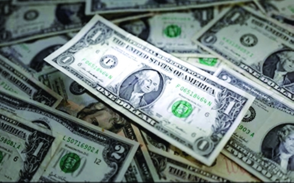 
US dollar banknotes are seen in this illustration . — Reuters 