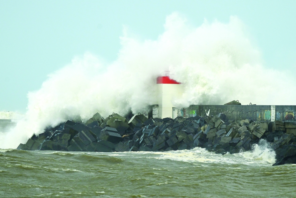 
Waves crash on the seawall in Boucau, southwestern France, as the storm Pedro hits the region. — AFP 