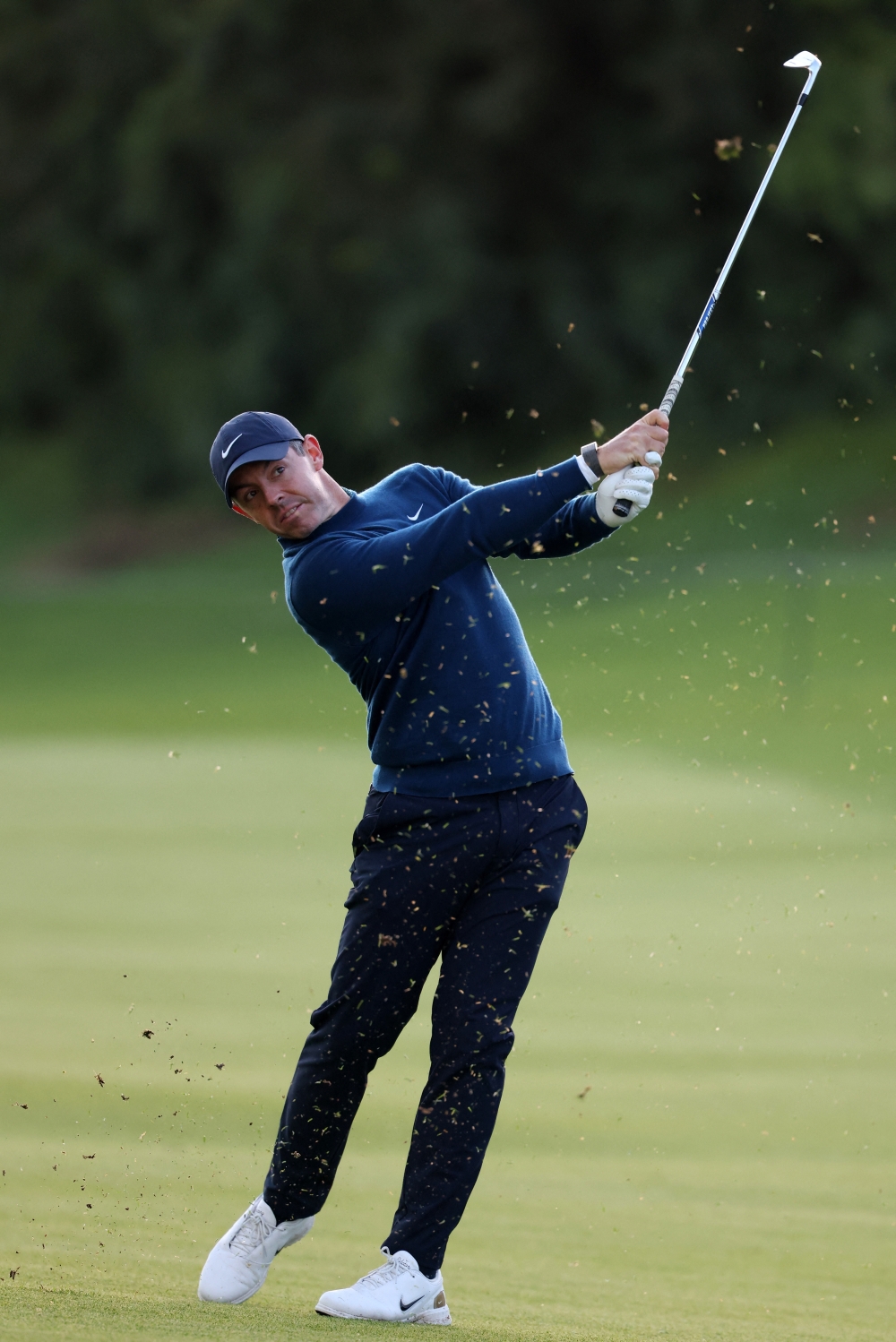  Rory McIlroy hits his fairway shot on the 18th hole 