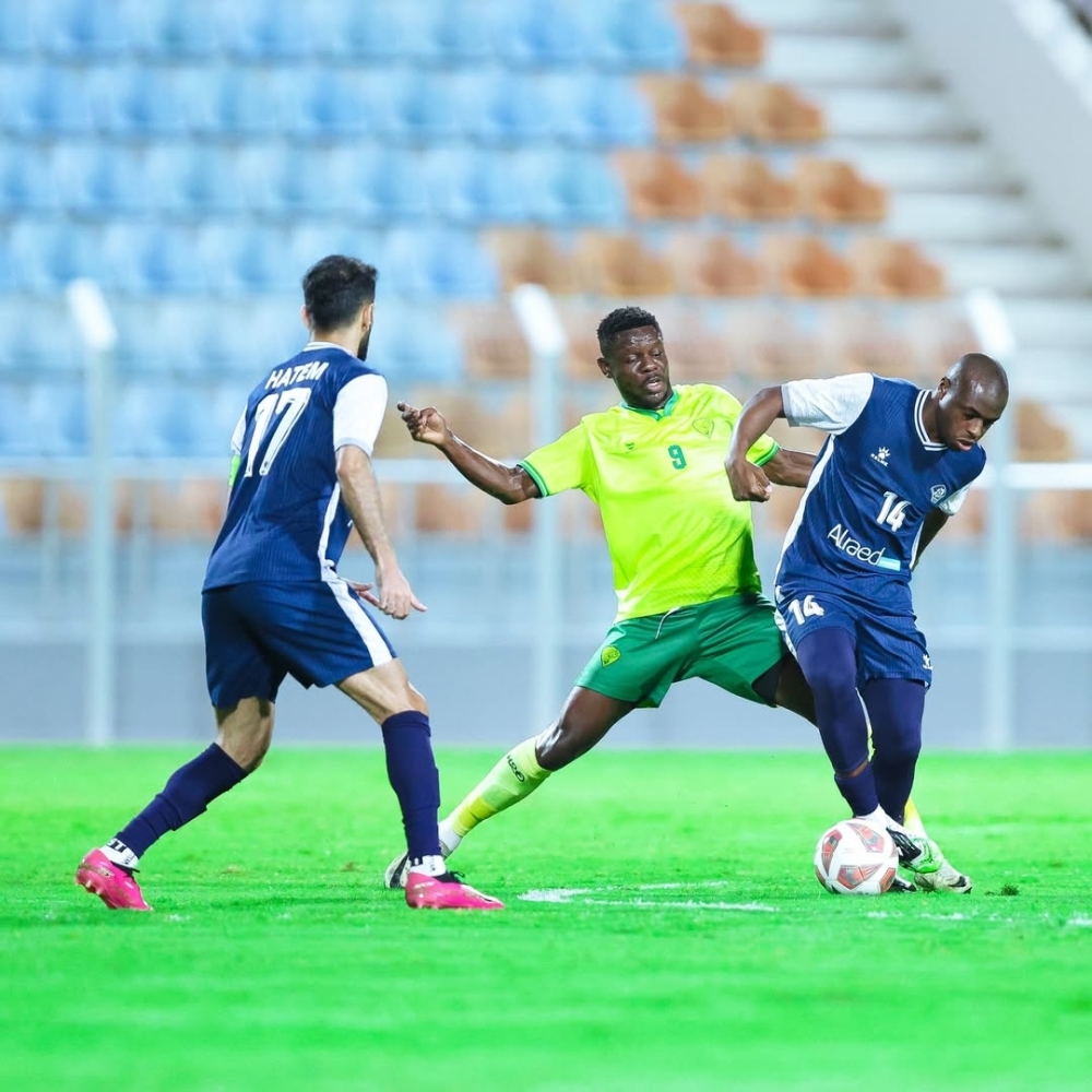 Al Shabab and Al Khabourah players in action during the match.