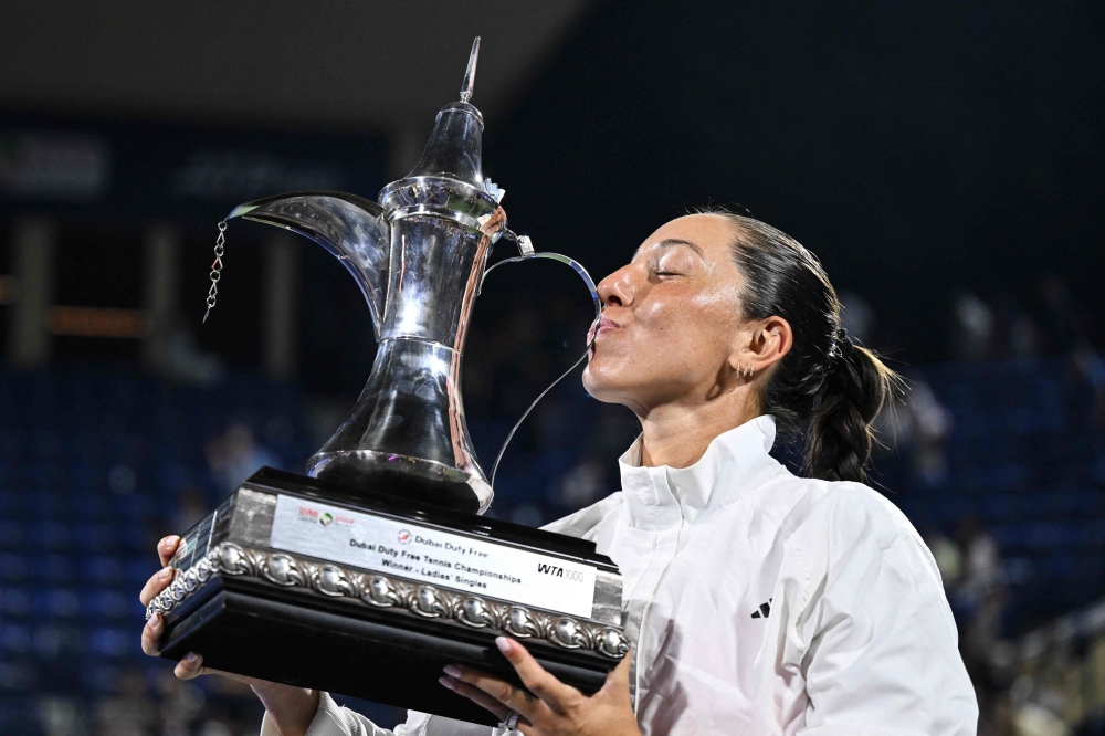 US' Jessica Pegula celebrates with the trophy  