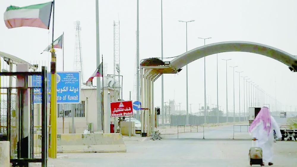 A Kuwaiti passenger is seen heading to Kuwait at the border gate between Iraq and Kuwait, at Safwan border crossing near Basra, Iraq. - Reuters file photo