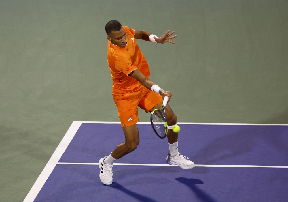   Canada's Felix Auger-Aliassime in action against China's Zhizhen Zhang   