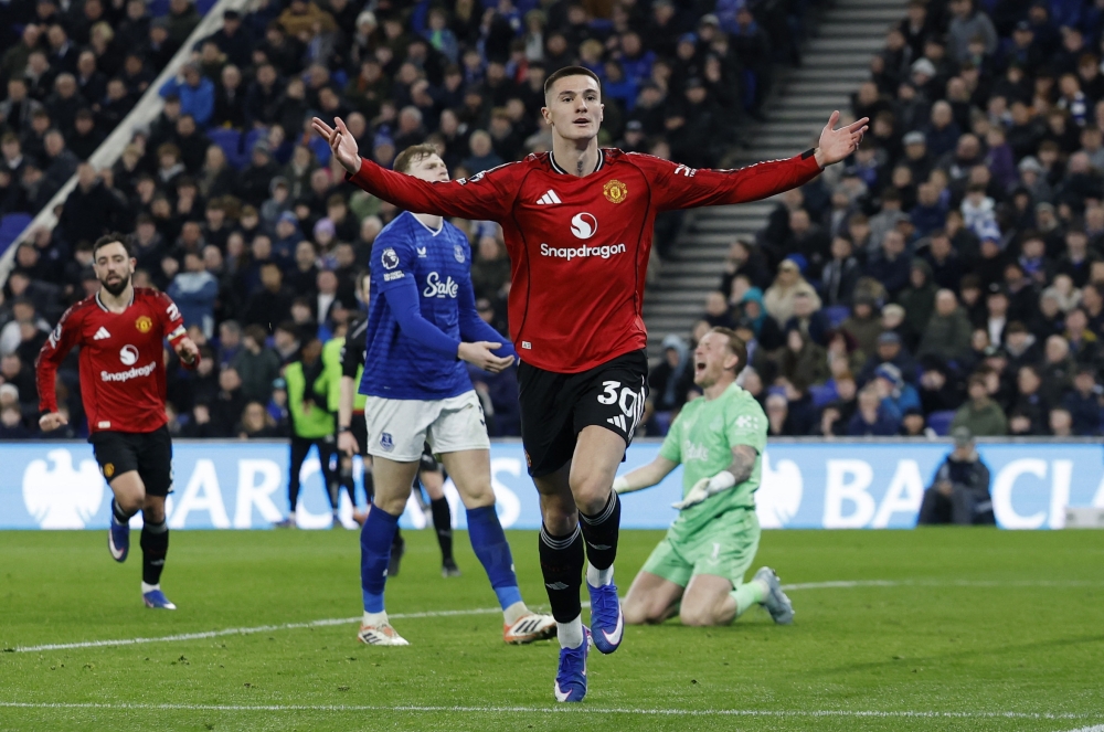   Manchester United's Benjamin Sesko celebrates scoring their first goal A 