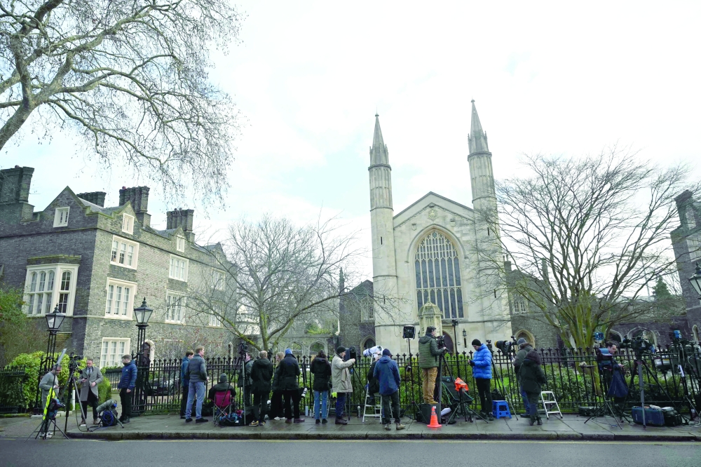 Reporters wait outside the home of former UK ambassador to the United States, Peter Mandelson, in central London. — AFP