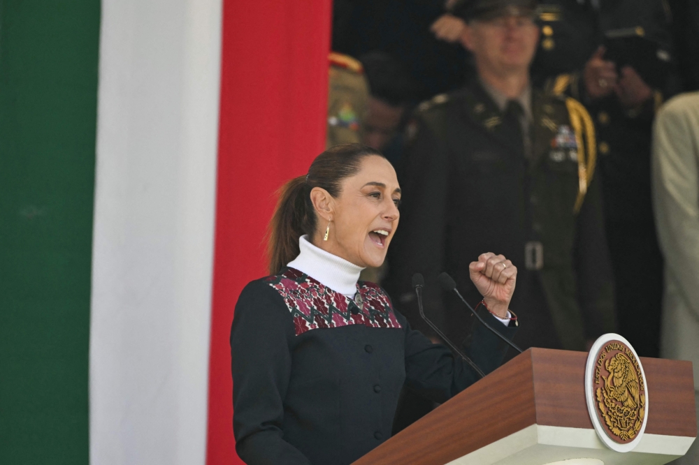 Mexico President Claudia Sheinbaum delivers a speech during the celebration of Flag Day. Sheinbaum offered "full guarantees" for the safety of football fans at World Cup games in the violence-plagued city of Guadalajara  
