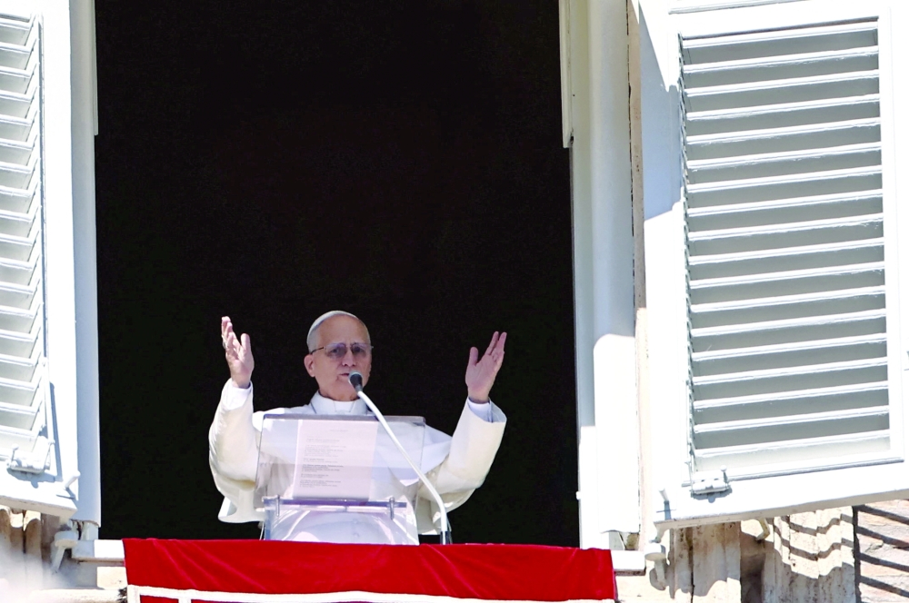 Pope Leo XIV leads the Angelus prayer from the window of the Apostolic Palace at the Vatican. — Reuters