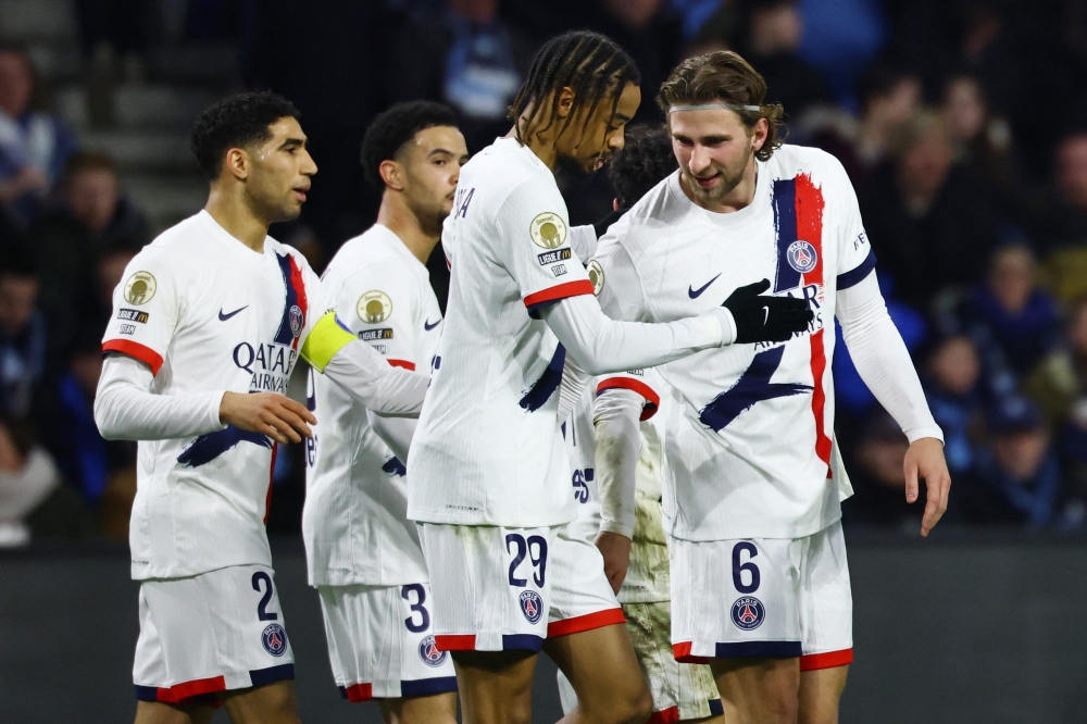 Paris St Germain's Bradley Barcola celebrates scoring their first goal with Illia Zabarnyi 