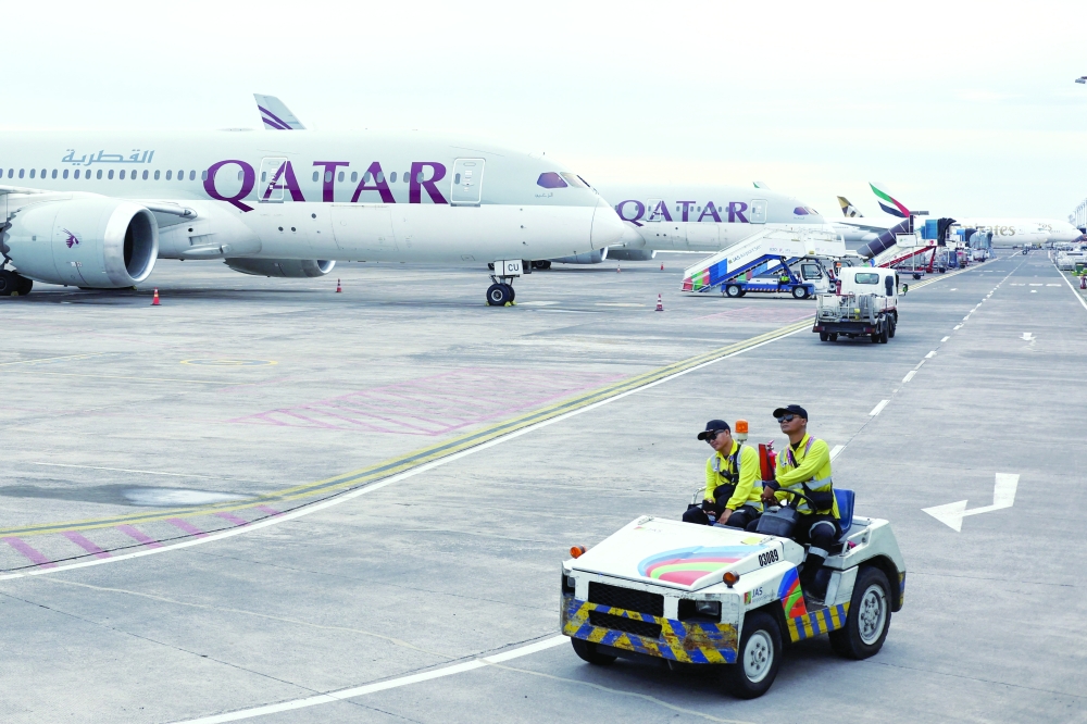 Qatar Airways and Emirates Airways plane are parked at I Gusti Ngurah Rai International Airport, Bali, Indonesia. — Reuters 