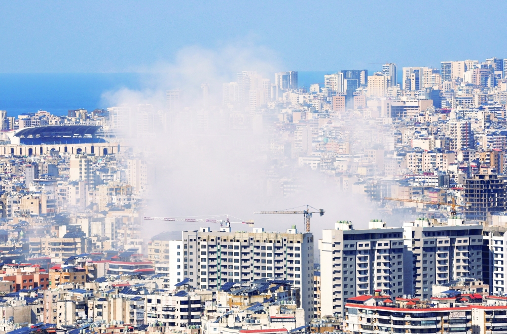Smoke rises after an Israeli strike on Beirut's southern suburbs. — Reuters