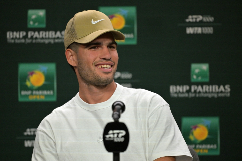  Carlos Alcaraz (ESP) speaks to the media at a news conference during the BNP Paribas Open at the Indian Wells Tennis Garden 