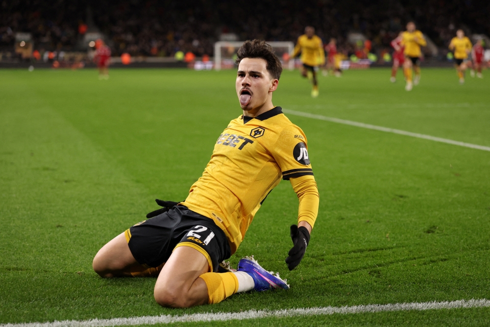   Wolverhampton Wanderers' Rodrigo Gomes celebrates scoring their first goal  