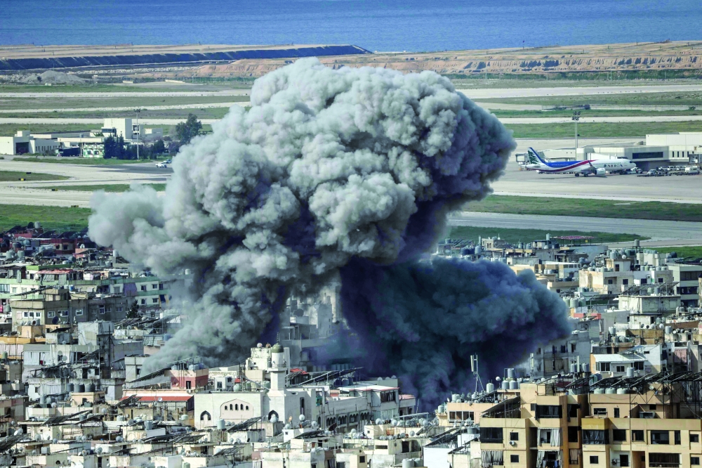 Smoke rises from the site of an Israeli air strike that targeted the Al Lailaki neighbourhood in Beirut. — AFP