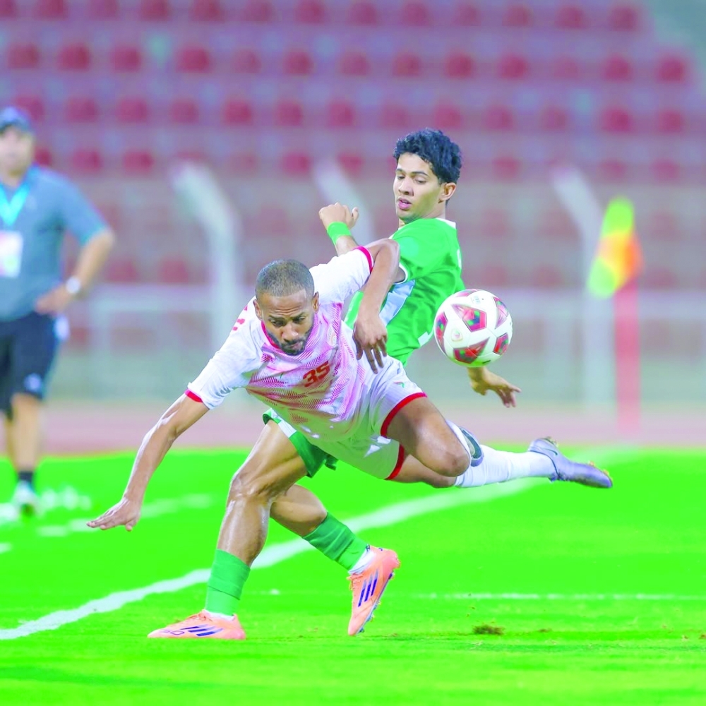 Al Nahda and Oman Club players in action during the Jindal League.