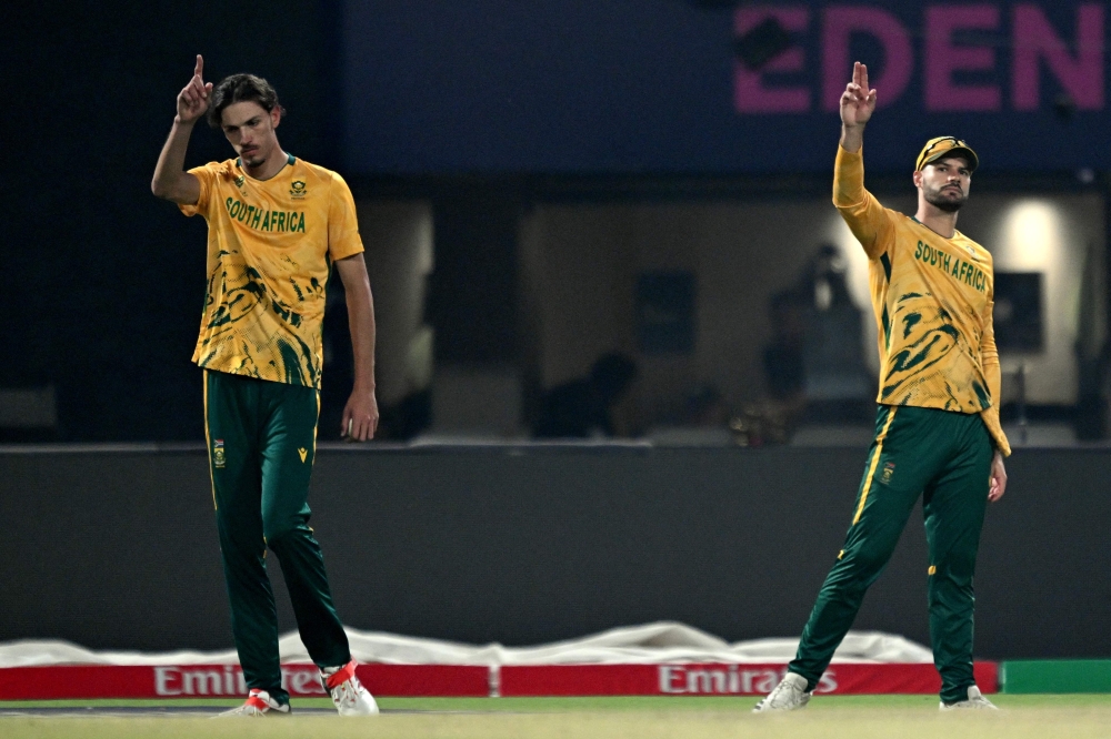 South Africa's captain Aiden Markram (R) and Marco Jansen gesture 
