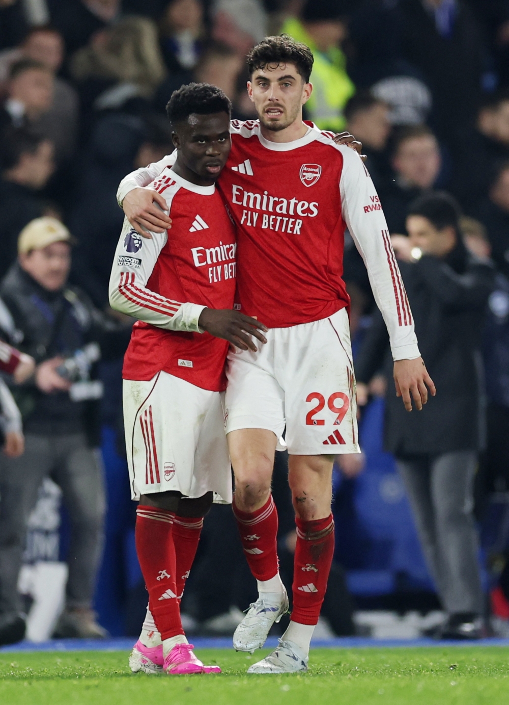   Arsenal's Bukayo Saka and Kai Havertz celebrate after the match  