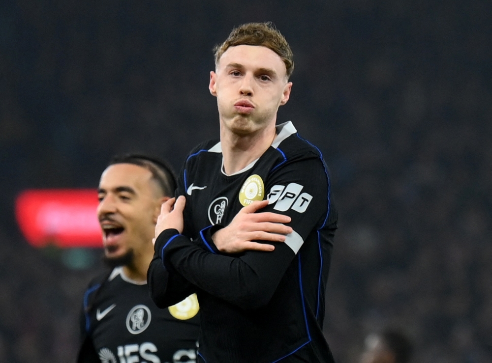   Chelsea's Cole Palmer celebrates scoring their third goal 