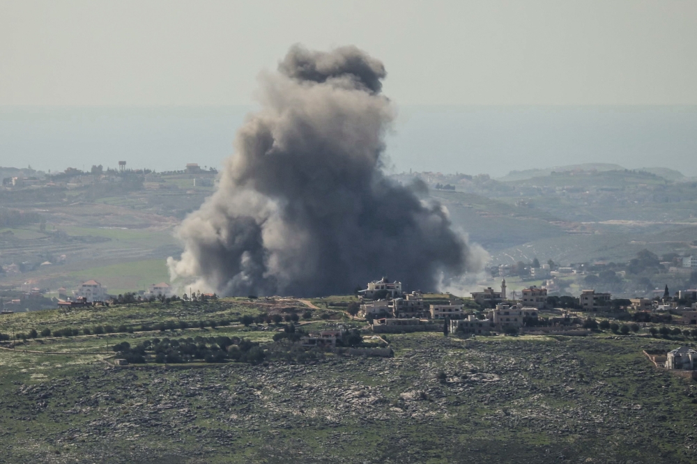 Smoke rises from the site of an Israeli airstrike that targeted the southern Lebanese village of Kfar Tibnit on March 5, 2026. Lebanon was drawn into the Middle East war on March 2, when Hezbollah attacked Israel in response to the killing of the Iranian supreme leader during US-Israeli strikes over the weekend. - AFP