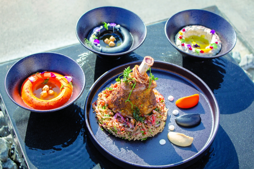 Lamb Shuwa, oriental rice and roasted carrot hummus