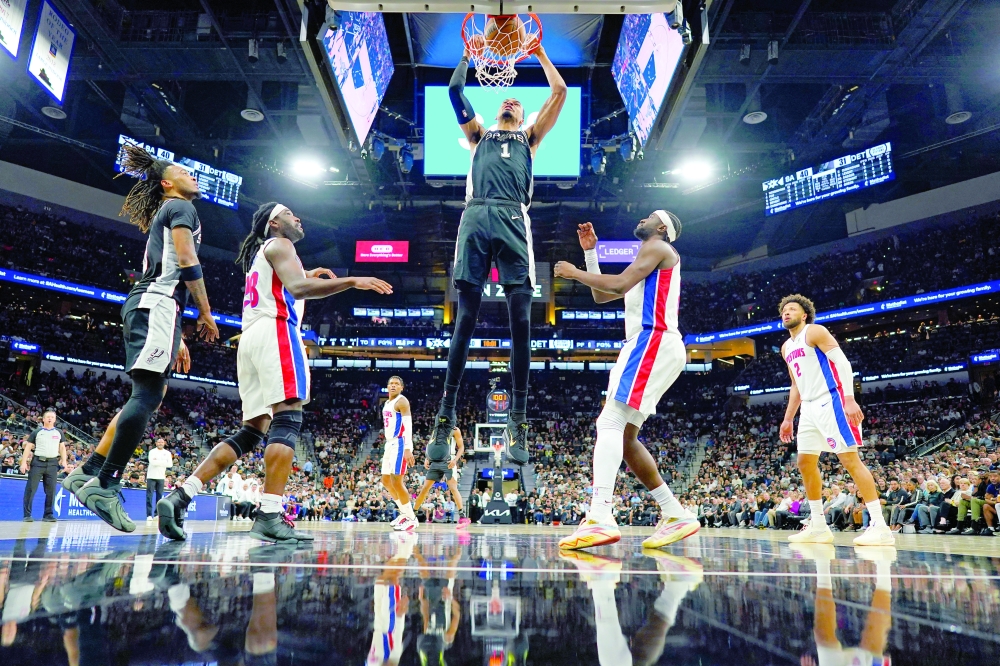 San Antonio Spurs' Victor Wembanyama (1) dunks over Detroit Pistons' Isaiah Stewart (28) and at Frost Bank Center. — Imagn Images