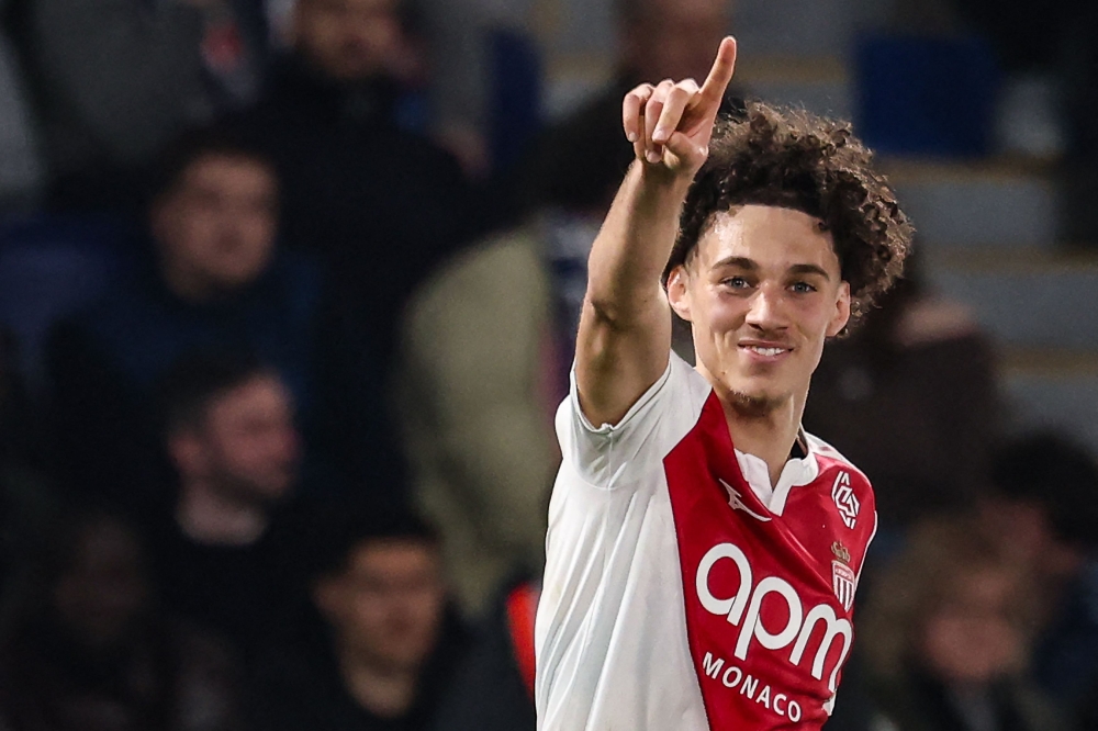 Monaco's French midfielder #11 Maghnes Akliouche   celebrates after scoring the opening goal