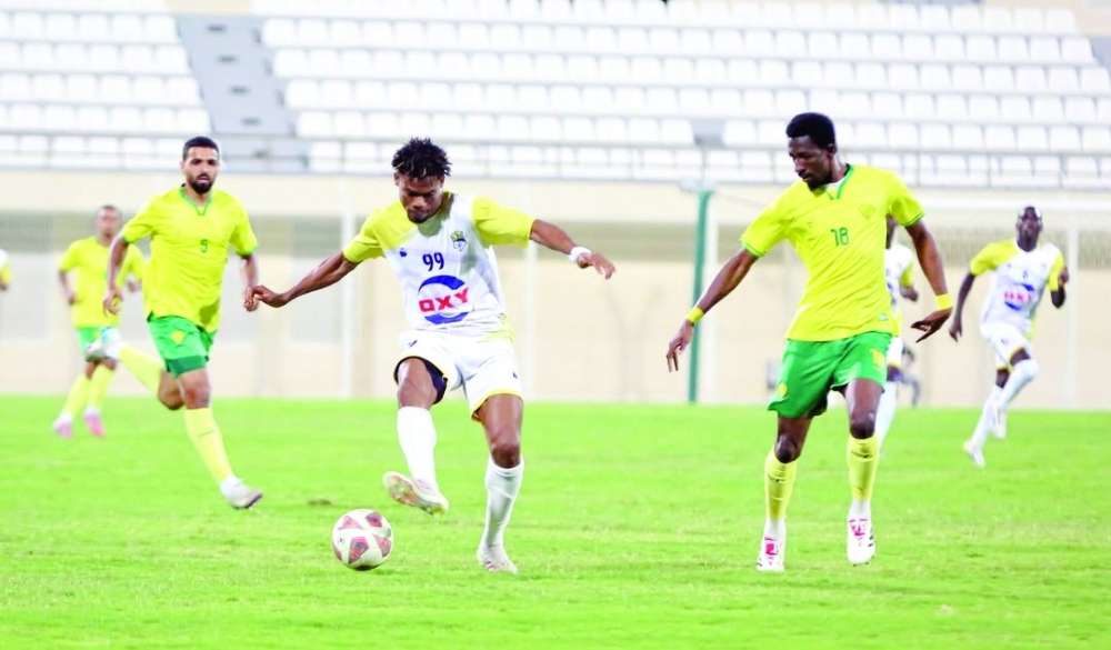 Ibri player controls the ball during round 16 of JL against Al Khabourah.