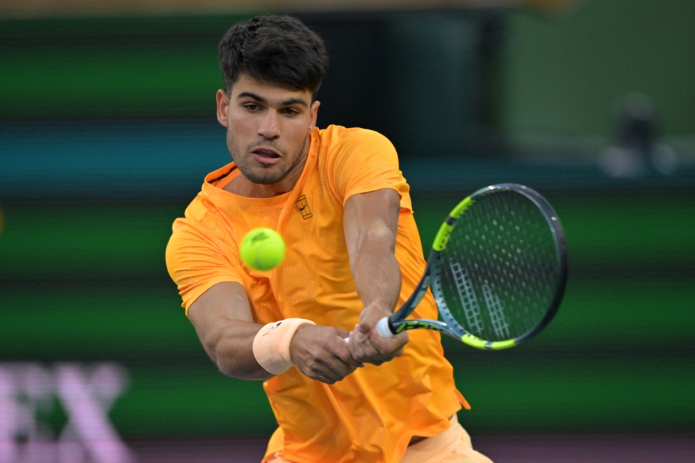  Carlos Alcaraz (ESP) hits a shot as he defeated Grigor Dimitrov (BUL)  
