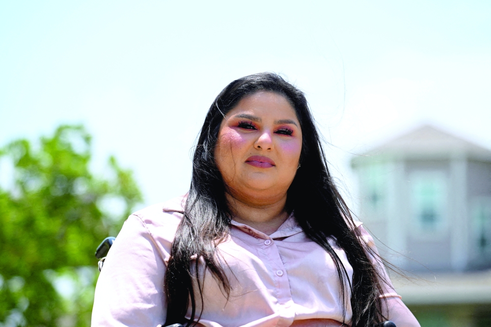 Loretta Torres, a stay at home mom who voted for Donald Trump in the 2024 presidential election, poses for a portrait at her home in Baytown, Texas, US. — Reuters