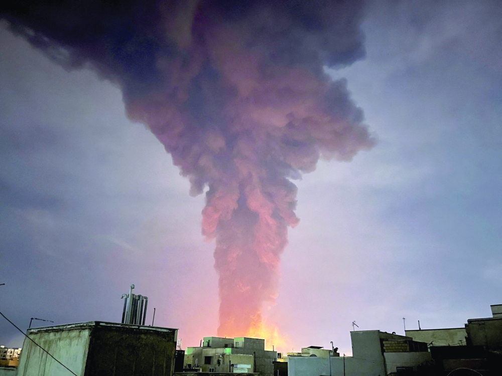 Smoke rises following an explosion, in Tehran. — Reuters
