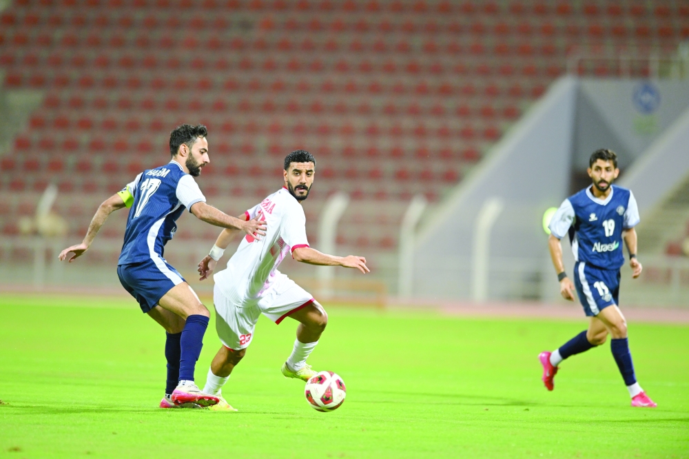 A strong battle in midfield as Al Shabab fight for control.