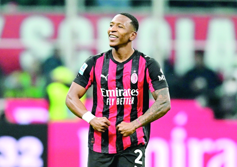 AC Milan's Pervis Estupinan celebrates scoring their first goal against Inter Milan during the Serie A match at San Siro, Milan, Italy. — Reuters