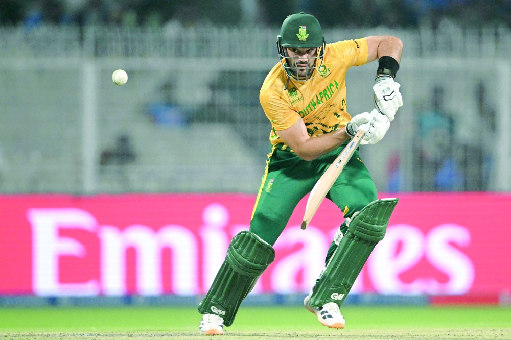 South Africa's captain Aiden Markram plays a shot during the 2026 ICC Men's T20 Cricket World Cup semi-final match between New Zealand and South Africa at the Eden Gardens in Kolkata on March 4, 2026.  (Photo by Dibyangshu SARKAR / AFP)
