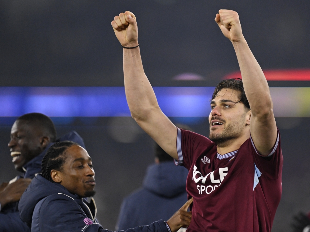   West Ham United's Konstantinos Mavropanos celebrates scoring the winning penalty in the penalty shootout  
