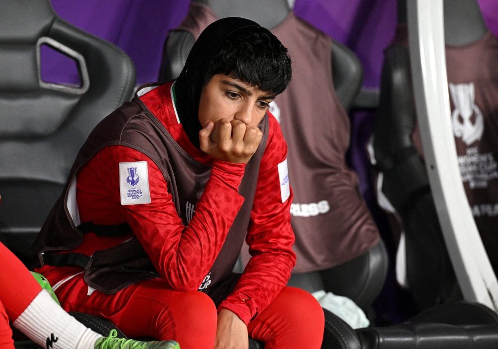 Mona Hamoudi of the Islamic Republic of Iran sits on the bench during the AFC Women’s Asian Cup Group A match between Iran and the Philippines at Gold Coast Stadium  