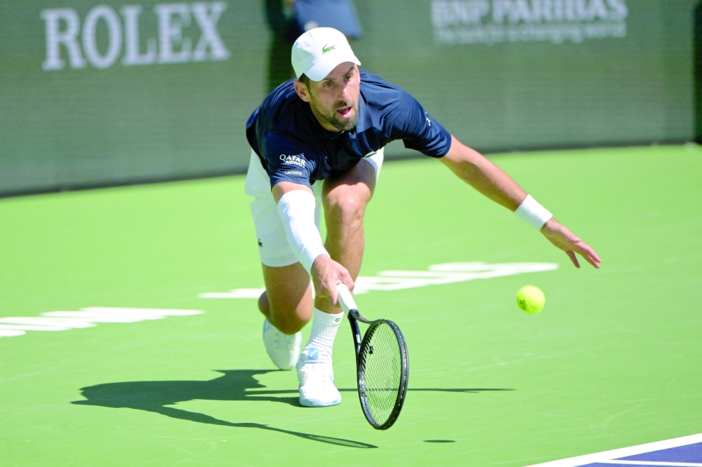 Novak Djokovic (SRB) hits a shot during his third round match as he defeated Aleksandar Kovacevic (USA) during the BNP Paribas Open at the Indian Wells Tennis Garden. — Imagn Images