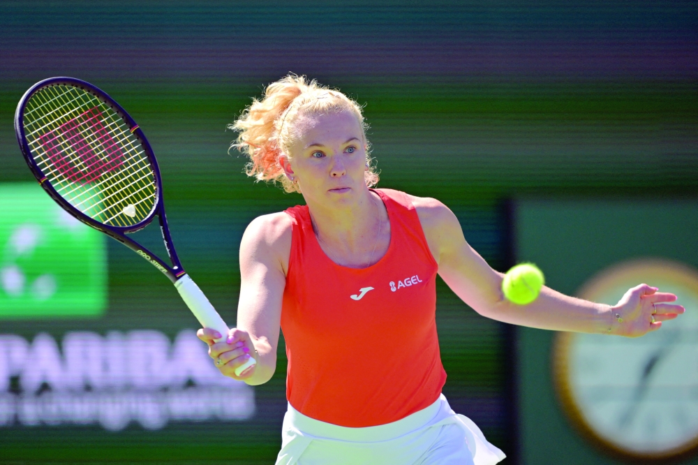 Katerina Siniakova (CZE) hits a shot during her third round match against Mirra Andreeva (RUS) in the BNP Paribas Open at the Indian Wells Tennis Garden. — Imagn Images