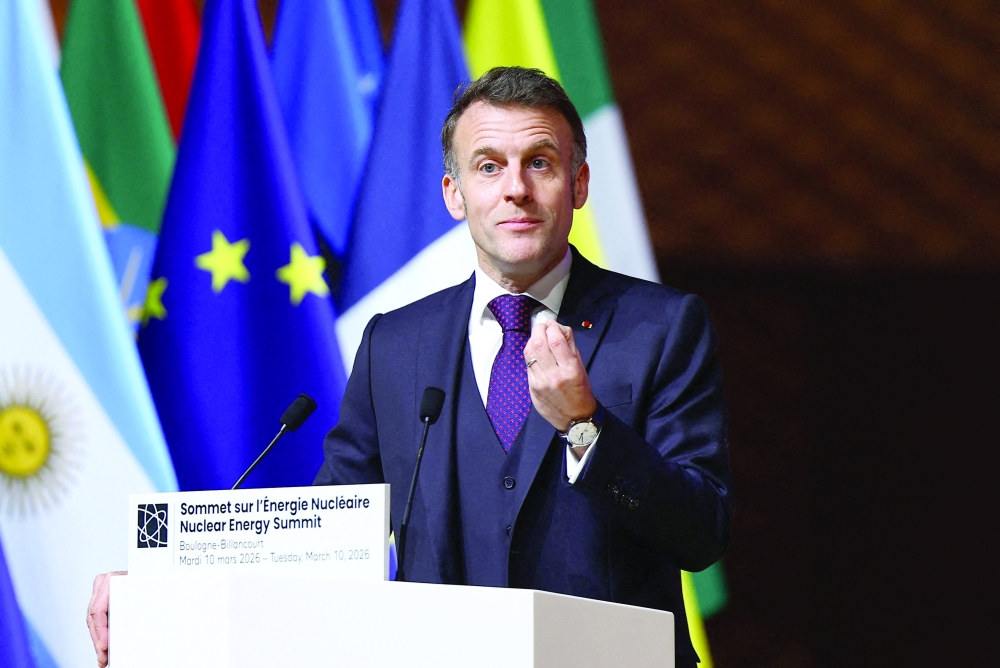 French President Emmanuel Macron addresses the Nuclear Energy Summit. — AFP