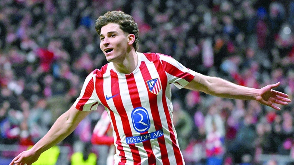 Atletico Madrid's Argentine forward #19 Julian Alvarez celebrates scoring his team's fifth goal during the UEFA Champions League last 16 first leg football match between Club Atletico de Madrid and Tottenham Hotspur at Metropolitano Stadium in Madrid on March 10, 2026.  (Photo by Javier SORIANO / AFP)