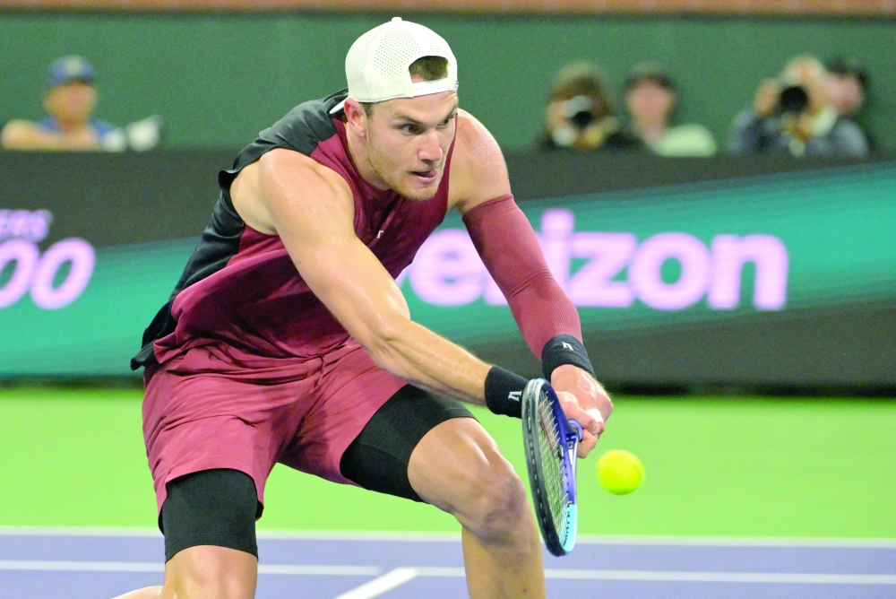 Jack Draper (GBR) hits a shot as he defeated Novak Djokovic (SRB) in the fourth round during the BNP Paribas Open at the Indian Wells Tennis Garden. — Imagn Images