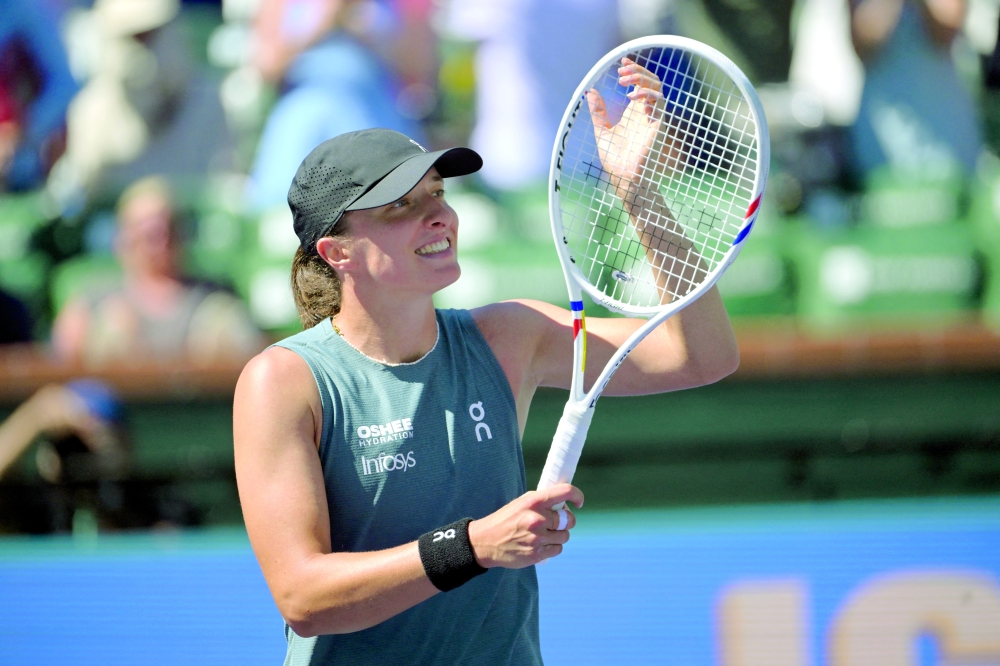 Iga Swiatek (POL) reacts after defeating Karolina Muchova (CZE) during the fourth round in the BNP Paribas Open at the Indian Wells Tennis Garden. — Imagn Images