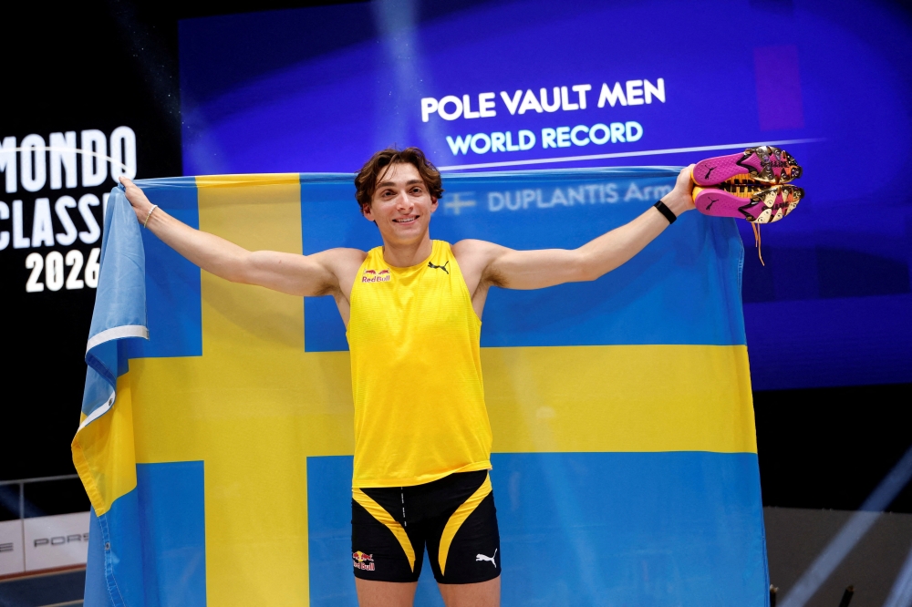Sweden's Armand Duplantis reacts after setting a new world record of 6.31m 