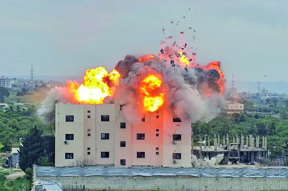 A fireball erupts from the site of an Israeli air strike that targeted a building in the southern Lebanese village of Abbasiyyeh. — AFP
