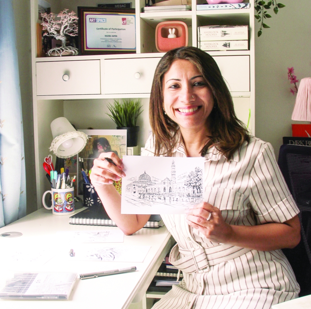 Rachel Eapen displays her illustrations at her home studio