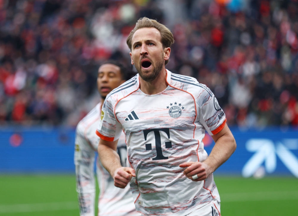   Bayern Munich's Harry Kane celebrates scoring a goal that was later disallowed  