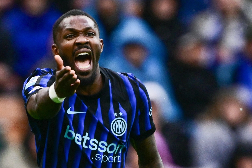 Inter Milan痴 French forward #9 Marcus Thuram reacts 