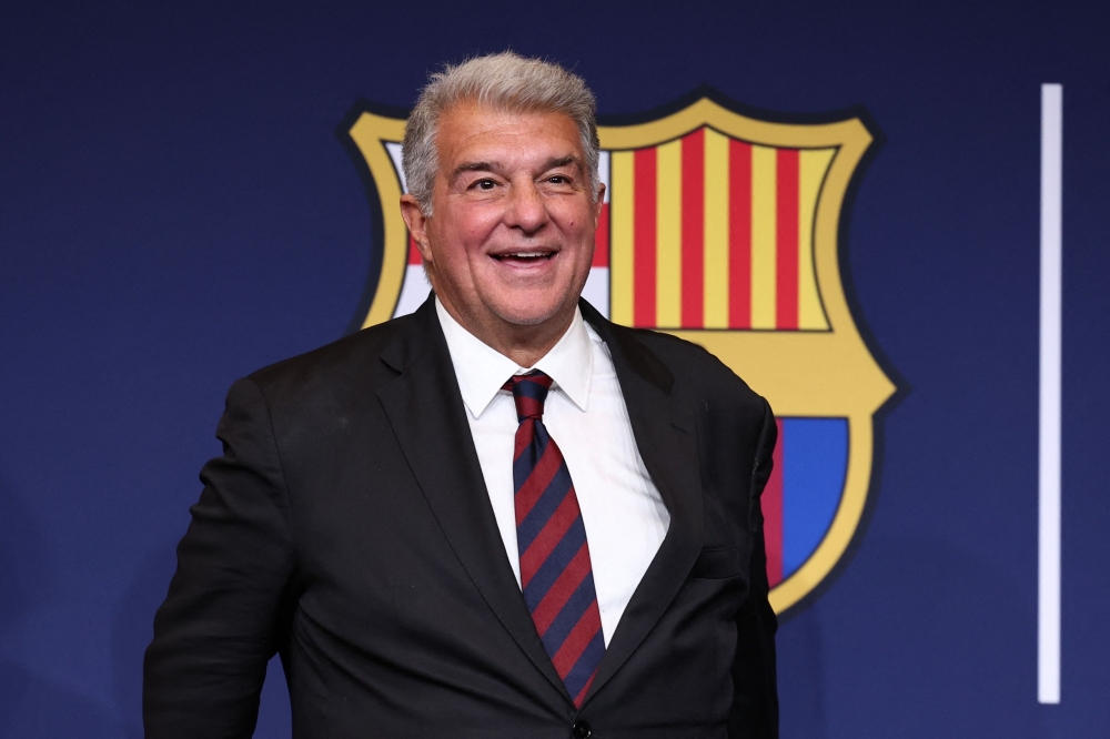 FC Barcelona candidate Joan Laporta smiles after winning the election for the presidency of FC Barcelona  